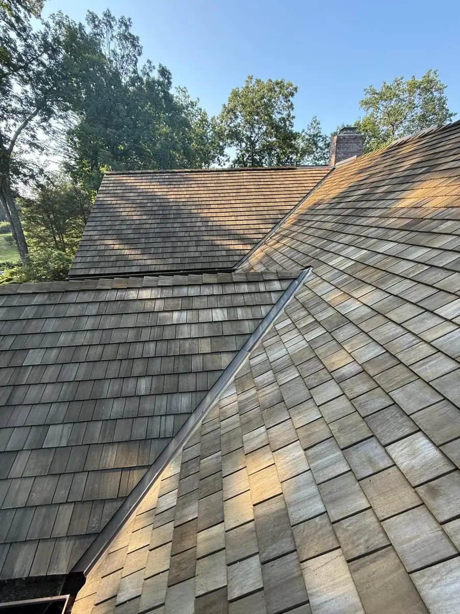 Cedar shake roof detail during service