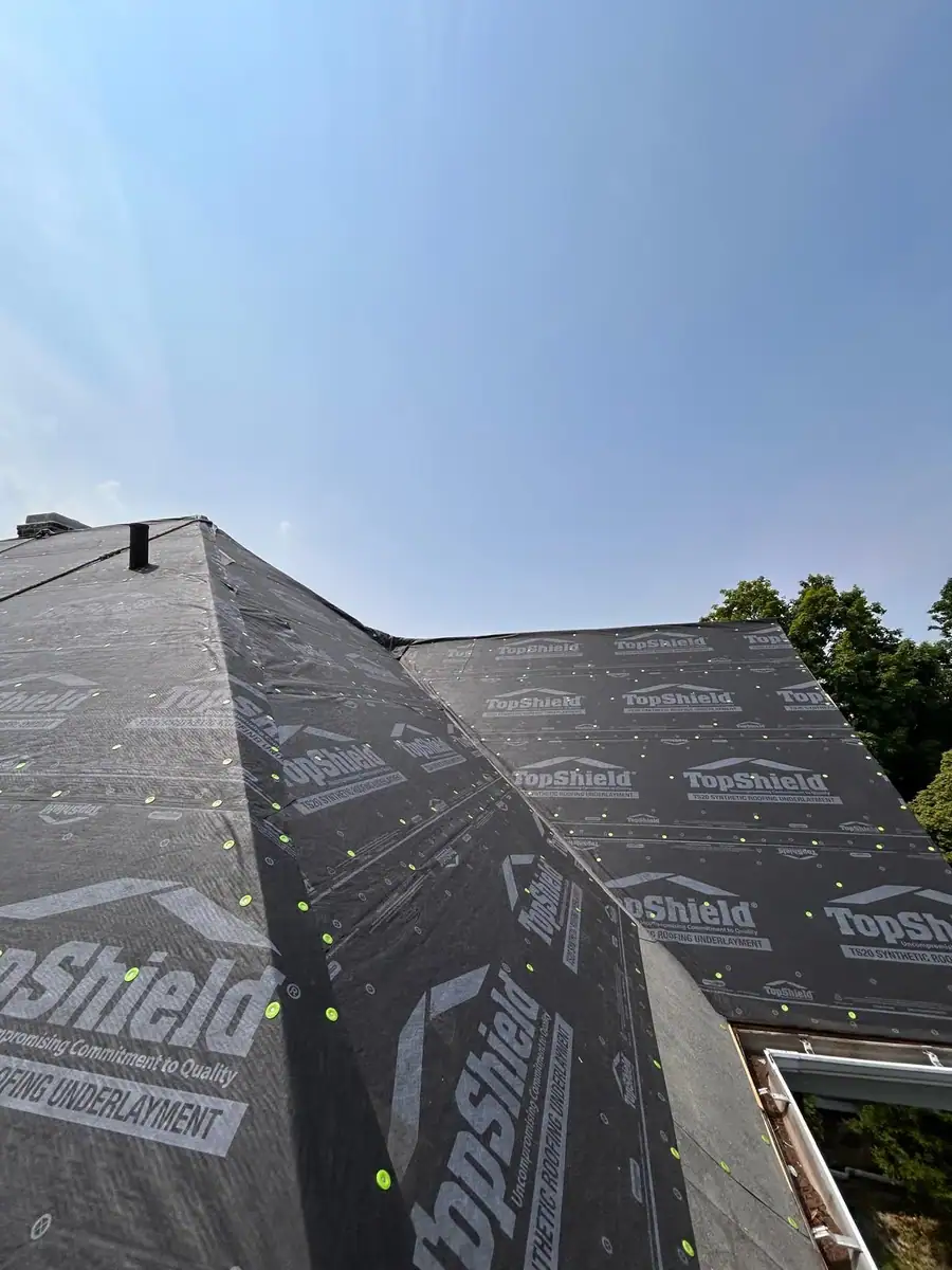 Roofing underlayment installed across roof slopes in Mamaroneck