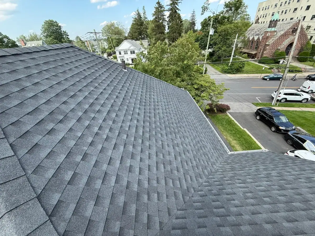 Completed gray shingle roofing system