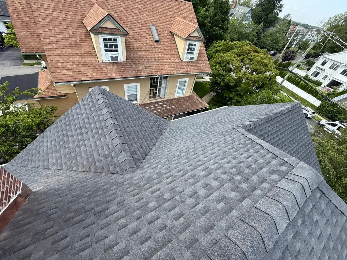Completed roofing details around dormers and ridge lines